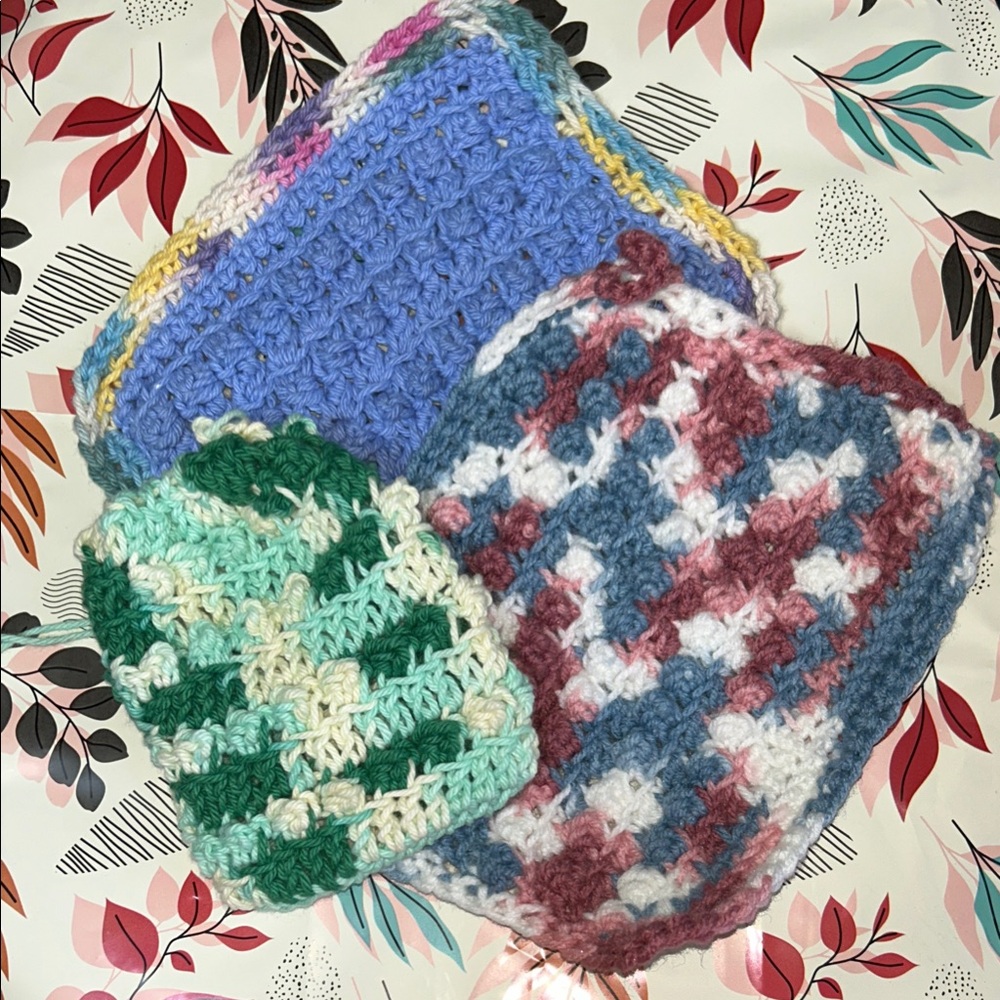Handmade Crochet wash cloths and draw string bag for soap slivers. In blue green
